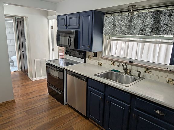 Kitchen with all appliances.
