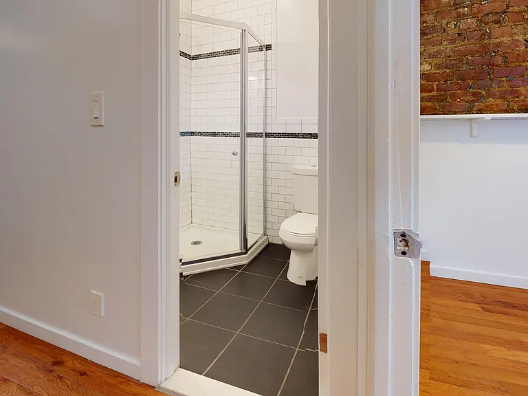 125 E 7th St #2W — Photo 10