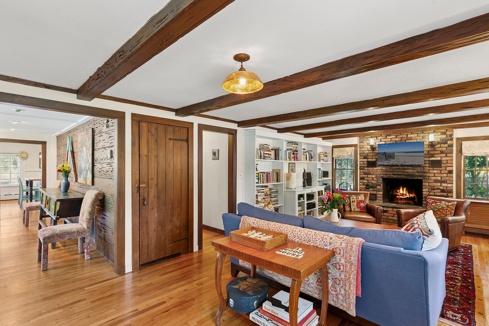 Beamed ceilings, wood burning fireplace,