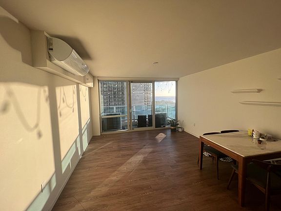 Living room with lanai facing Ala Moana Beach Park