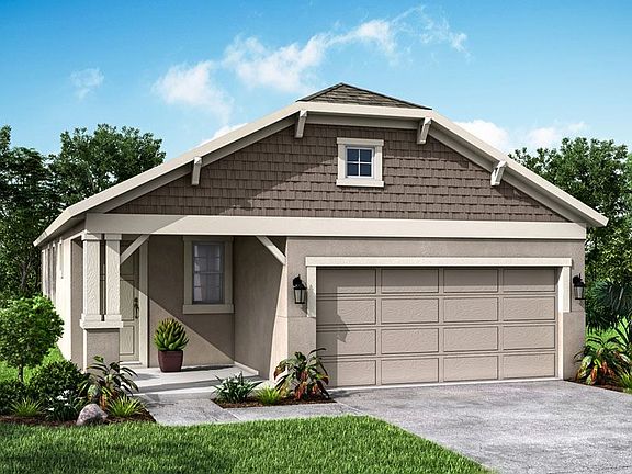 Flora French Country elevation only available at Bridgewater in Lakeland FL by William Ryan Homes Ta