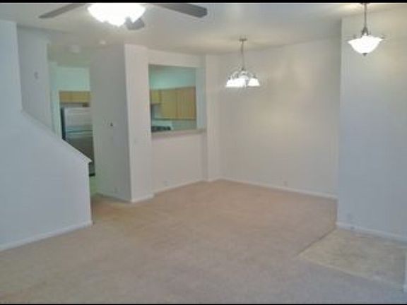 Living room/ dining room *not my photos, condo is in the mid