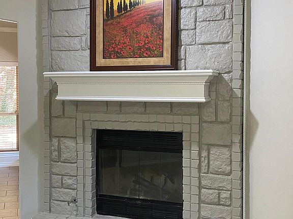 Beautiful wood-burning fireplace.