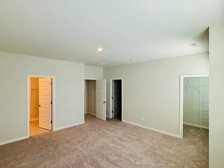Master Bedroom with His/Her closets and Master batch access