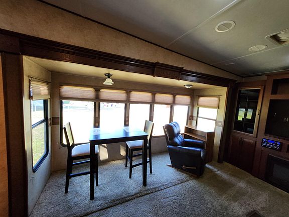 Lots of windows to let the light in with custom blinds for even more privacy.