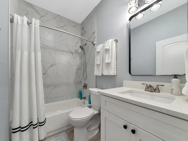 Guest Bathroom with Tub and Shower