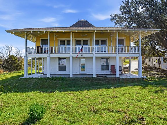 Cornerstone lake view peninsula exposed property with sunset and sunrise views. Private hoa dock and one of the rare few left as new docks on Lake Dallas aka Lewisville Lake ceased approval decades ago - only a few dozen exist on this biggest lake in DFW