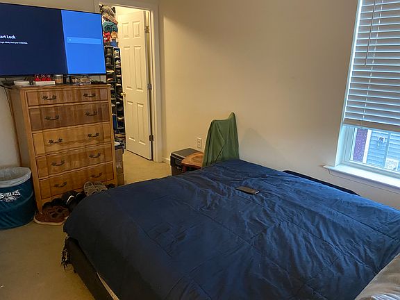 Reverse shot of private bedroom for new tenant including walk-in closet.