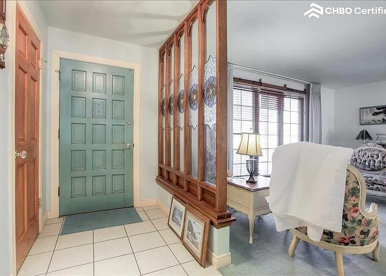 Entryway with gorgeous handmade stained glass