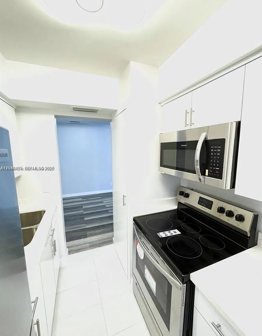 Town & Country Apts Condo — Photo 2