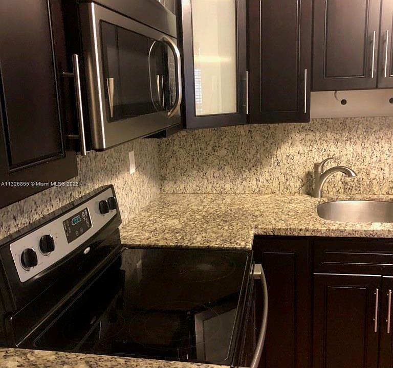 1st image of 300 Gardens Dr APT 104