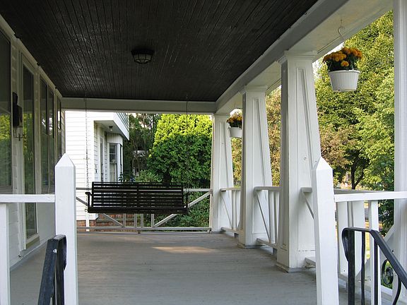 Relaxing Front Porch with Porch Swing