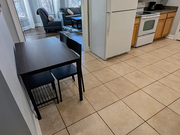 Kitchen looking into living room