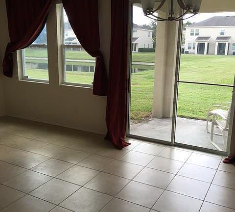 Living Room - view of backyard/pond