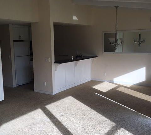 dinning room with counter bar into kitchen