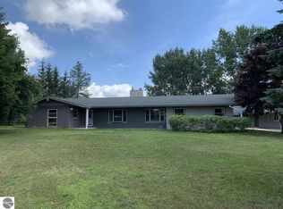 12304 Sutter Rd, Kewadin, MI 49648