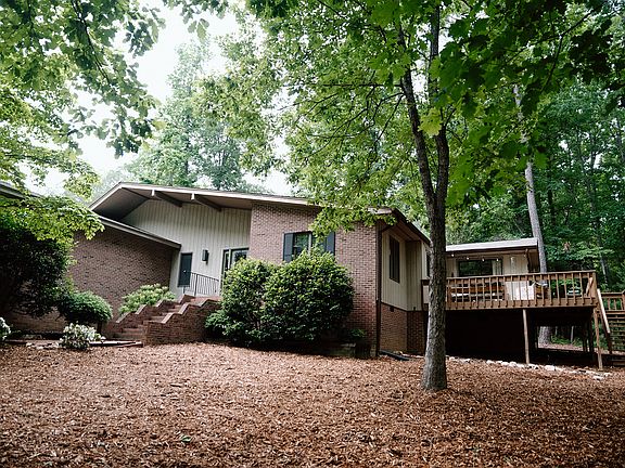 To the right is a wrap-around porch perfect for entertaining and relaxing.
