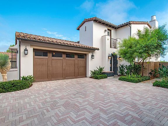 Front of the house with attached 2 car garage