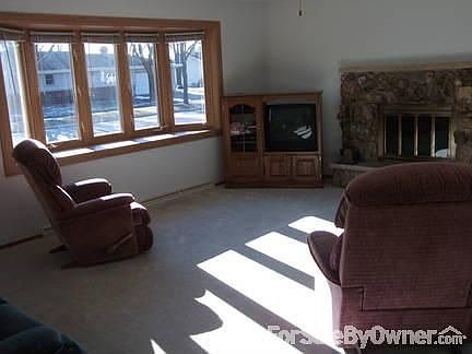 Kitchen with dining area in backround