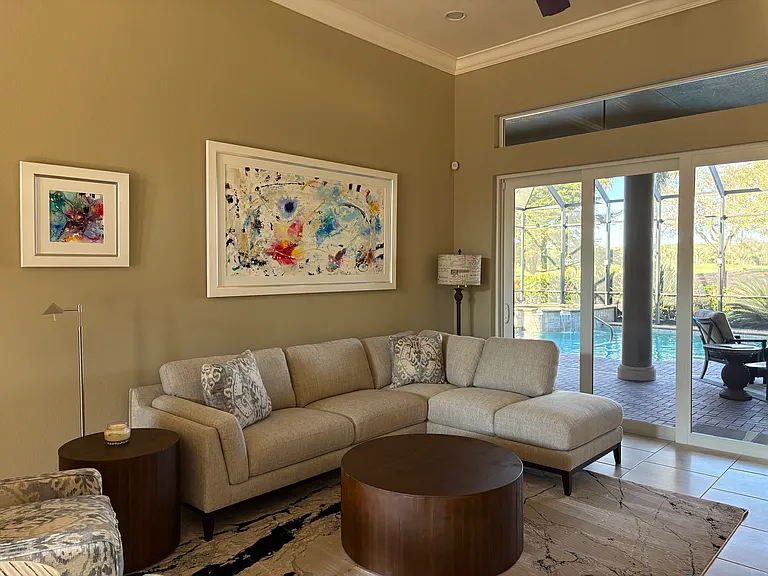 Second living area for reading, entertaining off the pool and kitchen