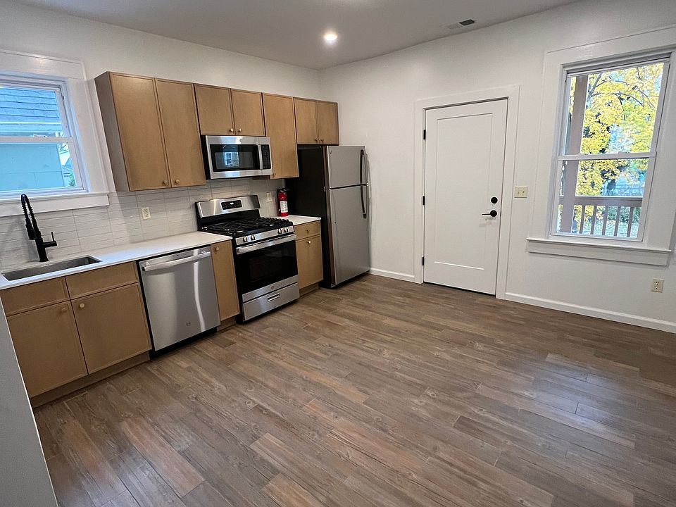 Large eat in kitchen with all new appliances, cabinets, and quartz countertops
