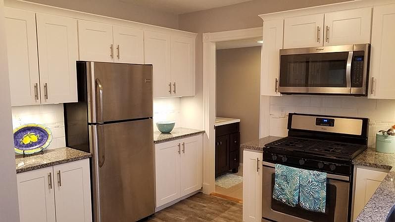 Chef's kitchen with granite, stainless, lots of counter space & great storage