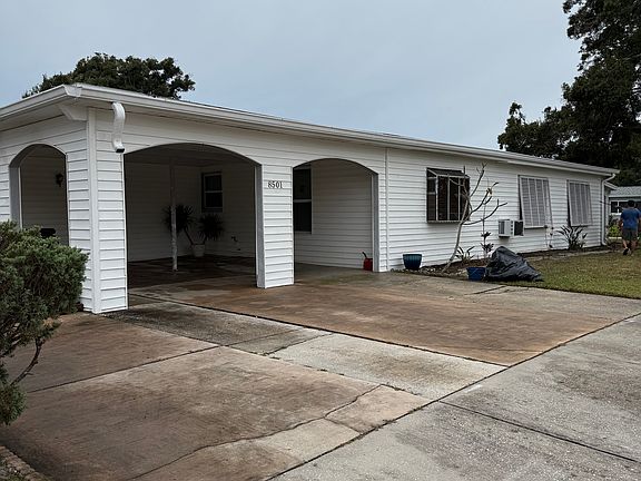 Two car carport, parking for additional three vehicles
