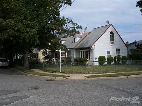 Farmingdale village cape cod with covered porch