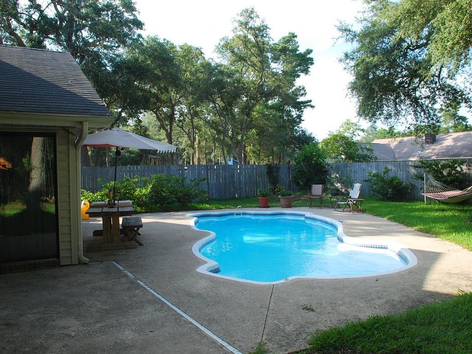 Backyard patio and pool. 