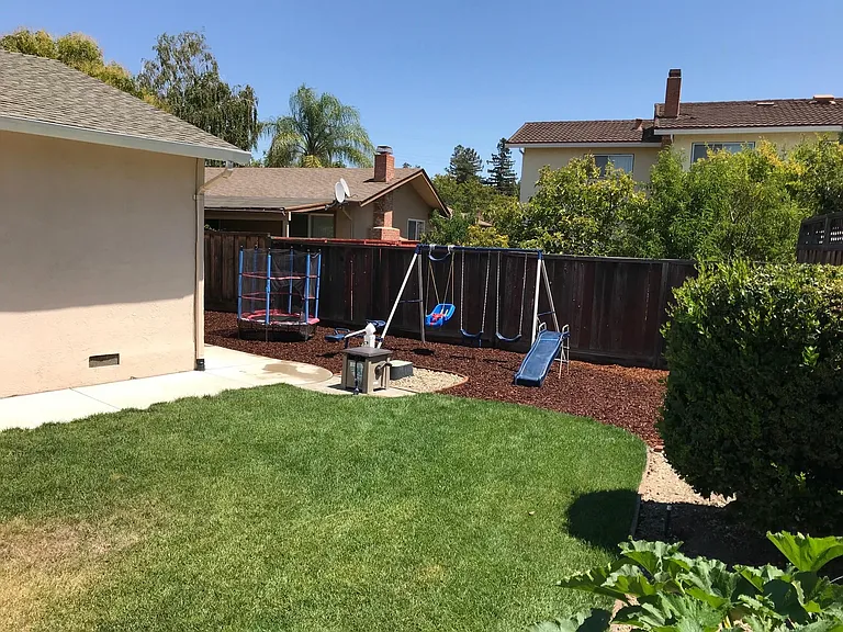 backyard - play structure is gone.