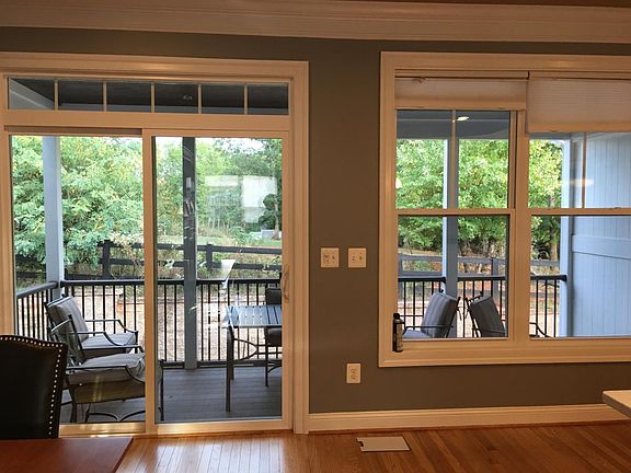 Porch overlooks vegetable garden