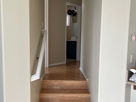 Short stairway to first bedroom/bathroom
