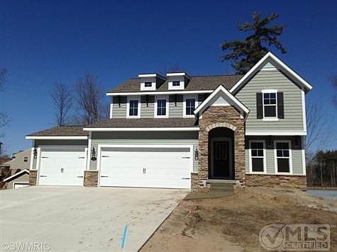 Our Sanibel home plan with stunning stone entry!