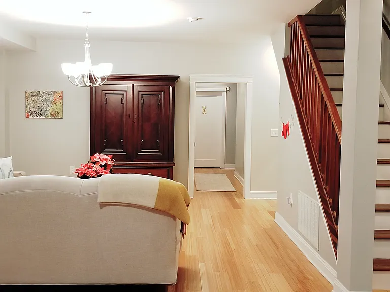 Living room; stairs to 2nd floor