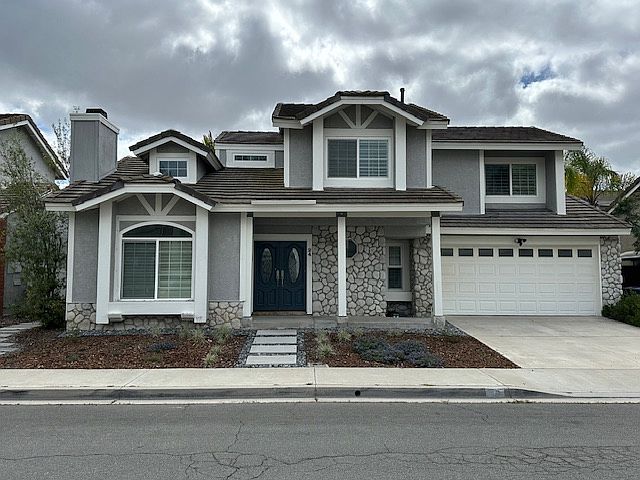 Front of the house with 2 car garage