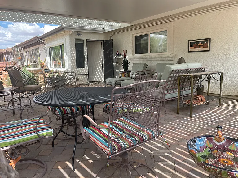 Everyone gets a comfortable seat in the outdoor living and dining room.