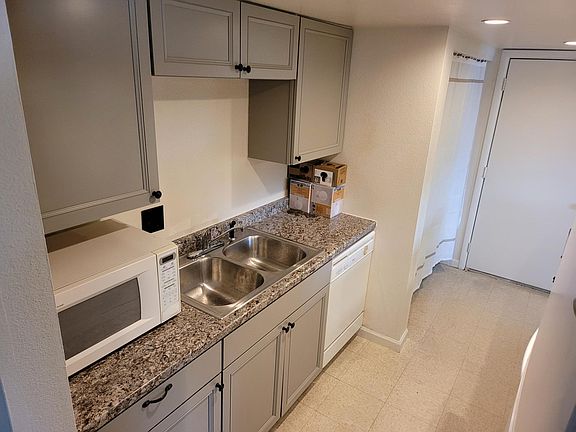 Kitchen Sink and Washer Area