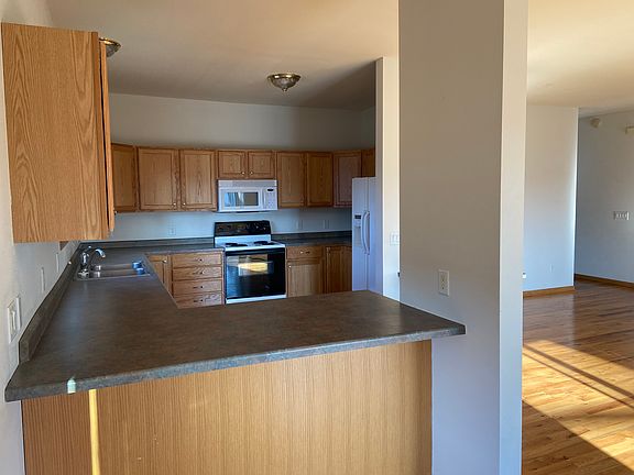 Kitchen with countertop bar area