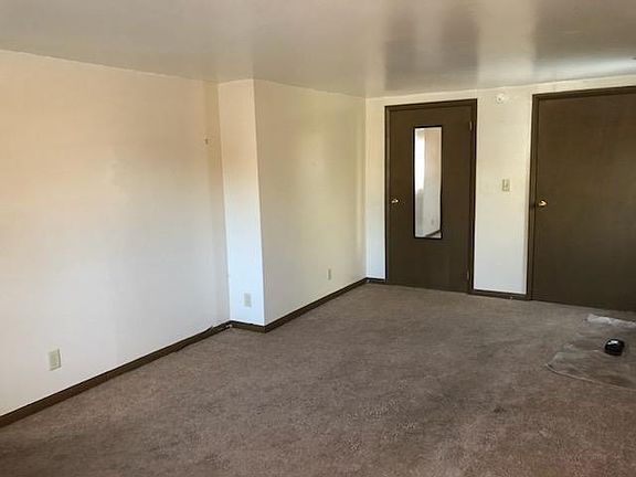Back of living room with large closet