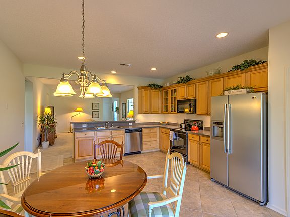 Upgrade tile, maple cabinets