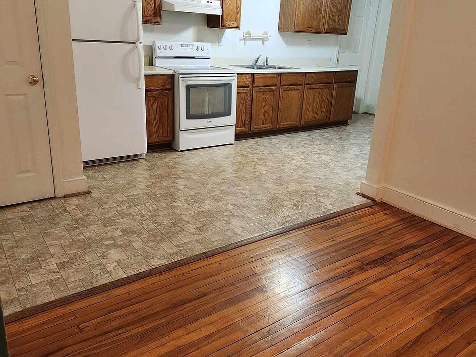 Kitchen with utility closet. Garbage disposal in sink.