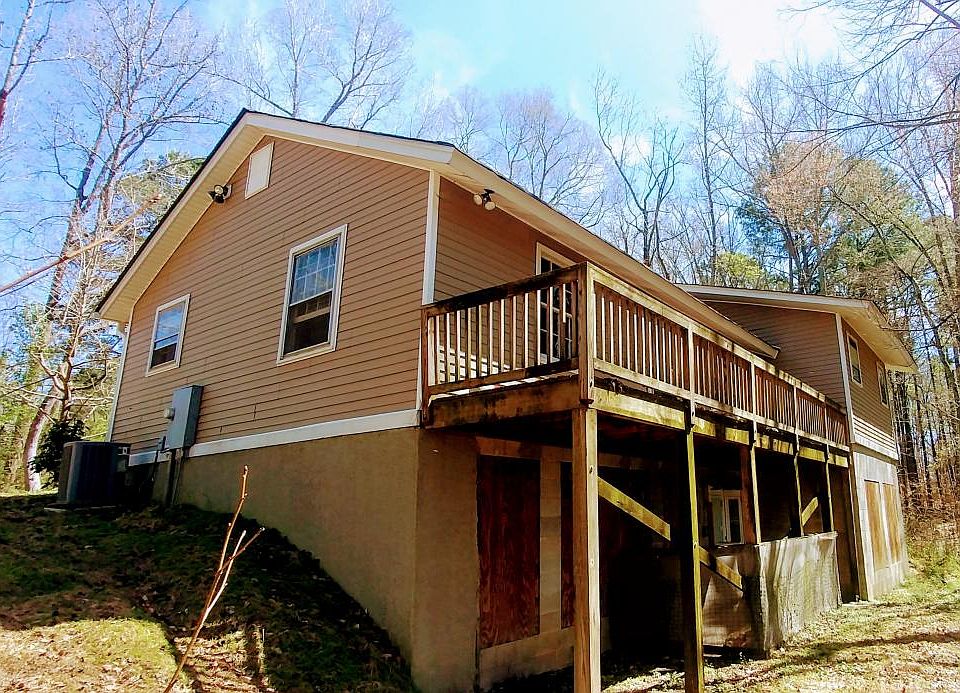 1,260 sqft unfinished home awaits a new buyer with vision and skill. 
