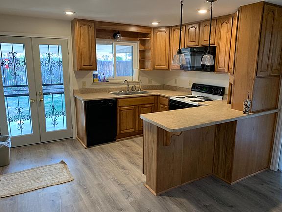 Eat in kitchen, view to backyard.