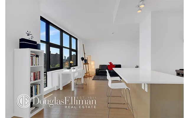 Sold by Douglas Elliman | media 11