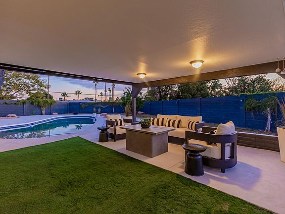 Entertainers dream with a 13,000 square foot lot featuring fully remodeled pool in 2020 that includes a huge 14 foot custom baja step, built in outdoor BBQ, expansive yard with real grass & sprinkler system, gigantic covered patio and RV gate. Monthly ren
