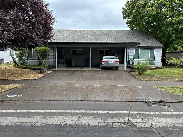 Duplex front with carport