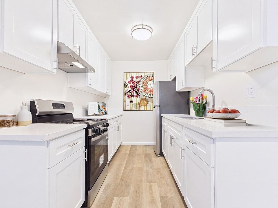 1st image of 8811 & 8825 Woodman Ave #1-15