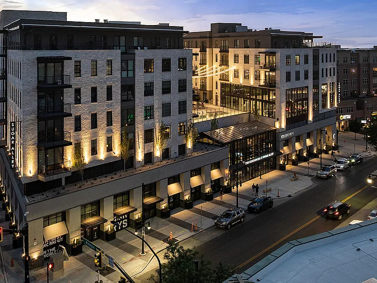 Upper floor view of Sugar Alley exterior at night