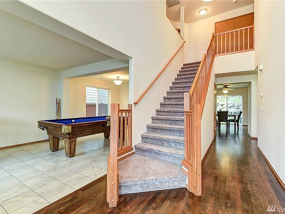 Grand entry (formal living/dining currently being used as pool table room)