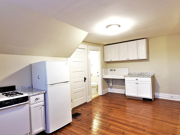 Living Space looking Towards Bathroom & Kitchen